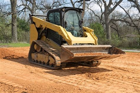 how to grade a slope with a skid steer|grading dirt with skid steer.